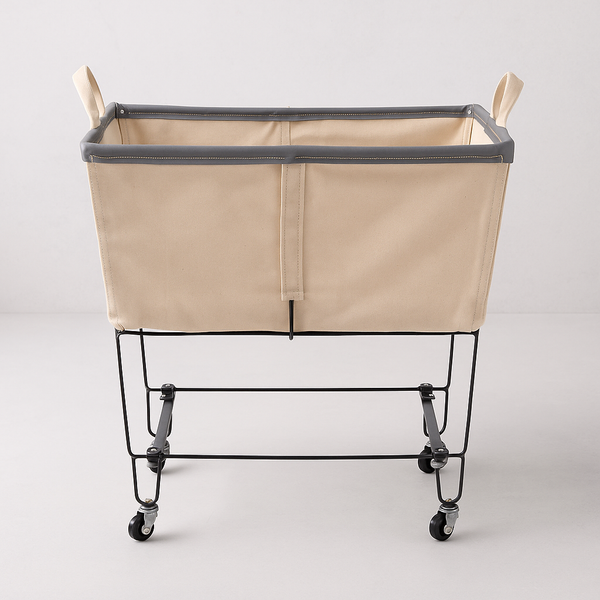 Steele 4-Bushel elevated rolling laundry hamper with natural canvas basket, gray trim, and black steel frame.