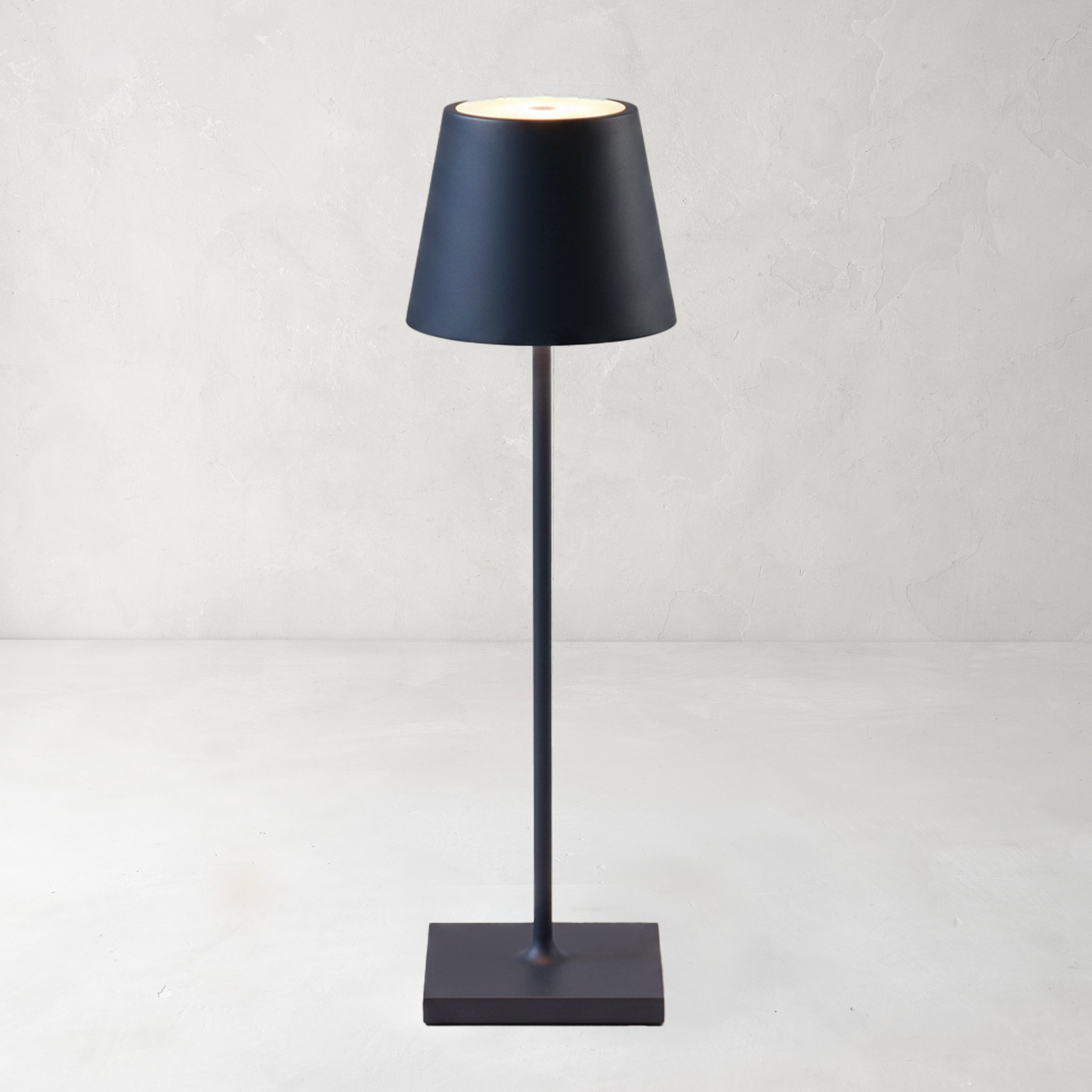 Steele Blue Poldina Pro rechargeable LED lamp with a sleek, minimalistic design and powdercoat finish.