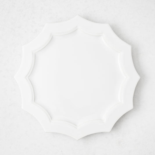 Stella 8.5-inch white ceramic salad plate with a decorative scalloped edge, made in Italy.
