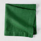 Stem HG Signature hand-dyed Kelly Green linen napkin, 22-inch square, folded.