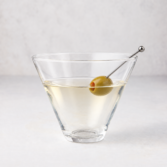 Clear 8 oz. stemless martini glass with a wide brim and a single olive on a metal pick against a light background.