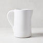 Stinson Medium Ceramic Pitcher, handmade white Italian ceramic with large handle and spout.