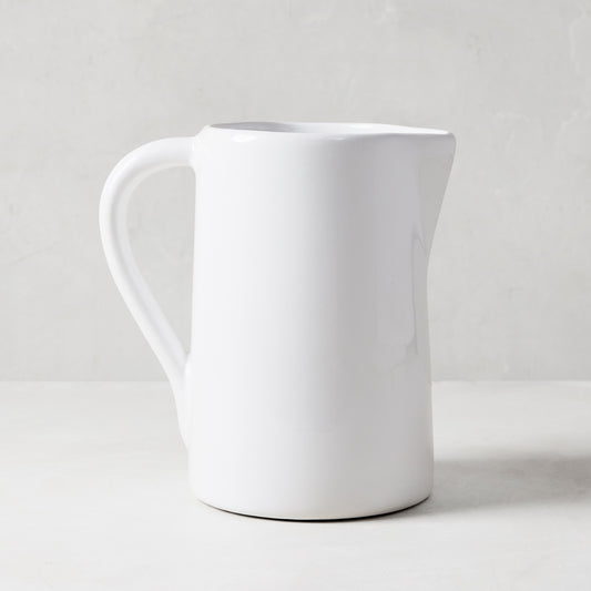 Stinson Medium Ceramic Pitcher, handmade white Italian ceramic with large handle and spout.