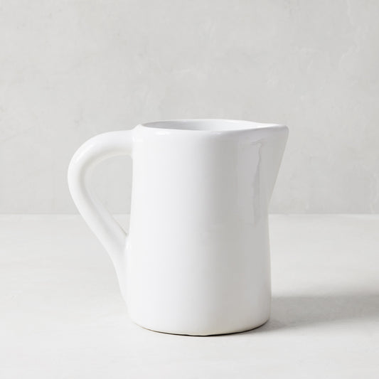 Stinson Small Ceramic Pitcher, handmade white Italian ceramic with large handle and spout.