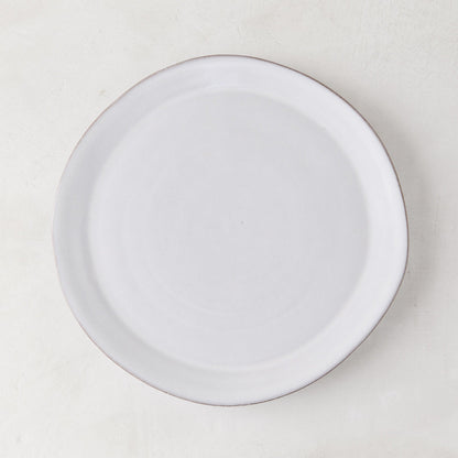 Stone Grey Salad Plate, 8.25" diameter, hand-glazed terracotta with a cool grey-white hue.