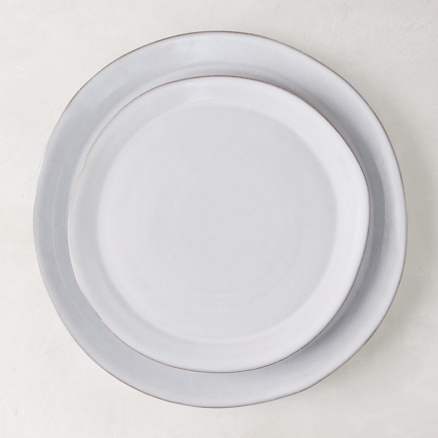 Stone Grey Dinner Plate, 10.75" diameter, hand-glazed terracotta in cool grey-white hue.