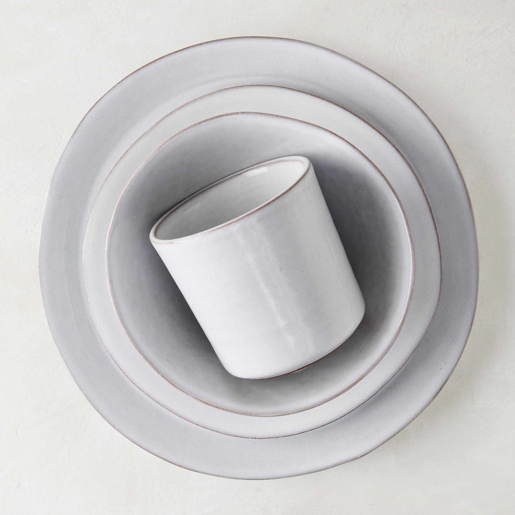 Stone grey hand-glazed terracotta dinner plate, salad plate, bowl, and mug set.