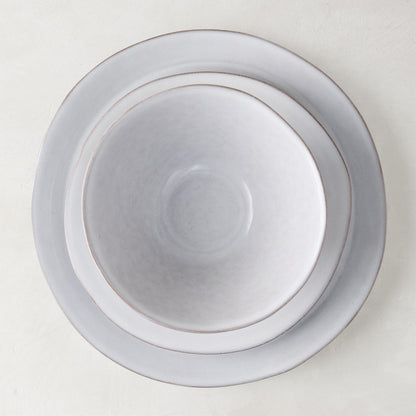 Stone grey hand-glazed terracotta dinner plate with a matching bowl, 10.75" diameter.