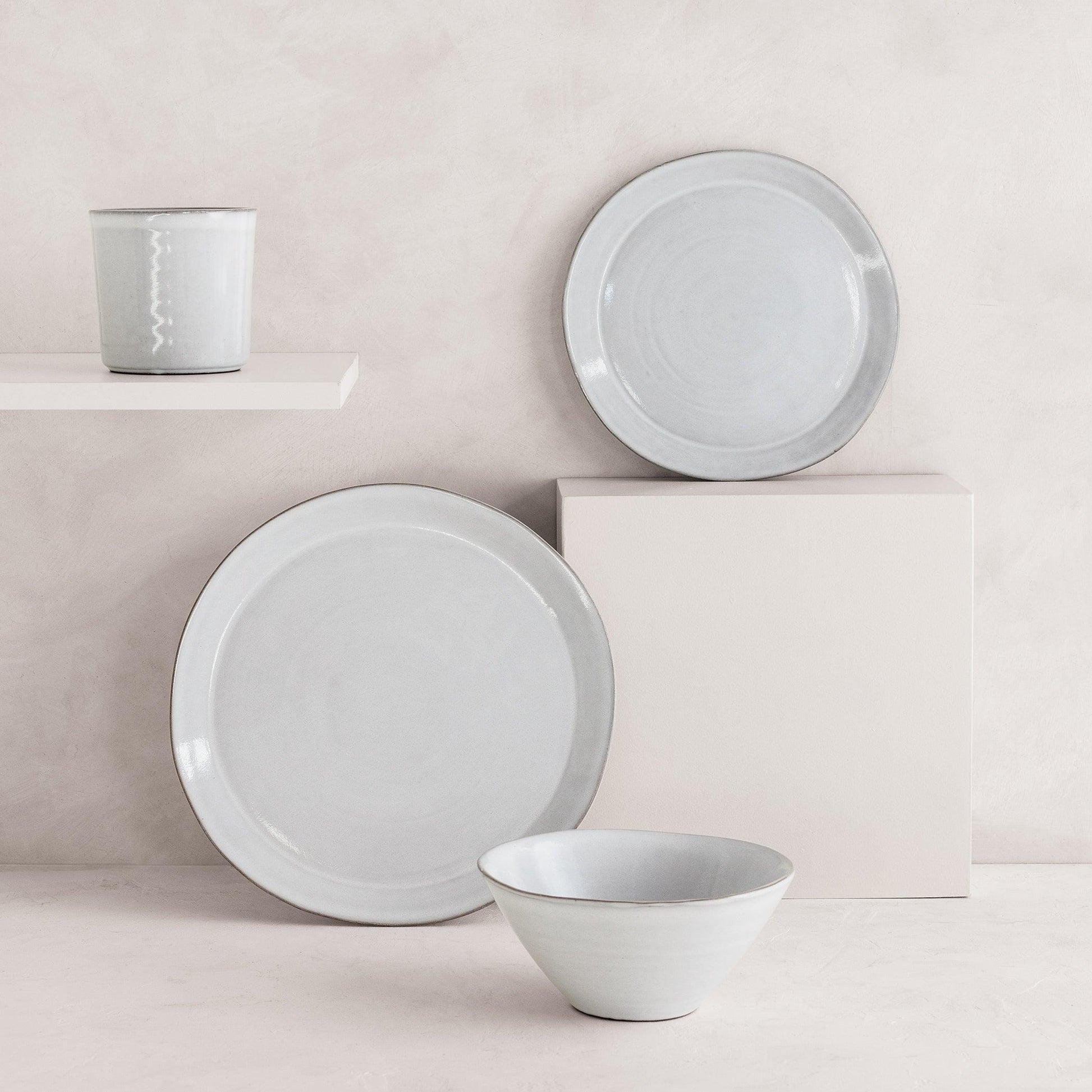 Stone grey terracotta dinner plate, salad plate, bowl, and mug set with hand-glazed finish.