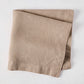 Stonewall Khaki HG Signature Hand-dyed Linen Napkin, 22-inch square, folded.