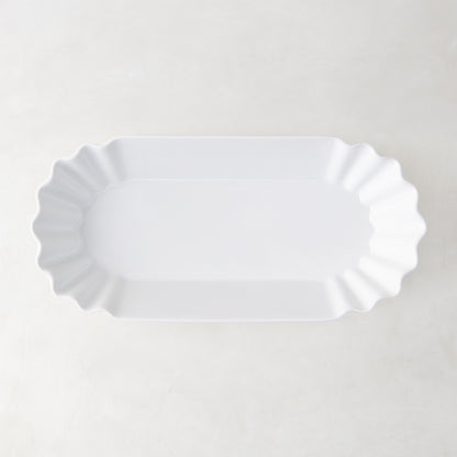 White Melamine Street Eats Hot Dog Holder, 9"L x 4"W, with scalloped edges.