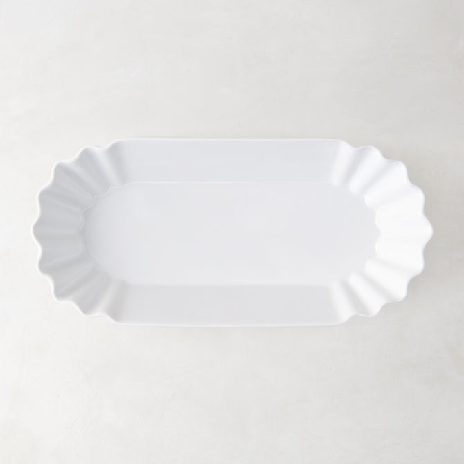 White Melamine Street Eats Hot Dog Holder, 9"L x 4"W, with scalloped edges.