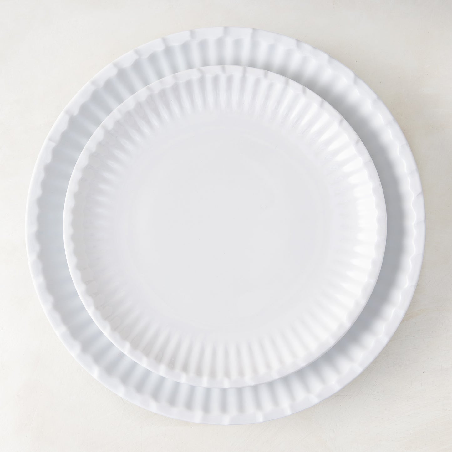 White Melamine Street Eats Salad Plate, 8.5" diameter, with a wavy, paper plate-inspired rim.