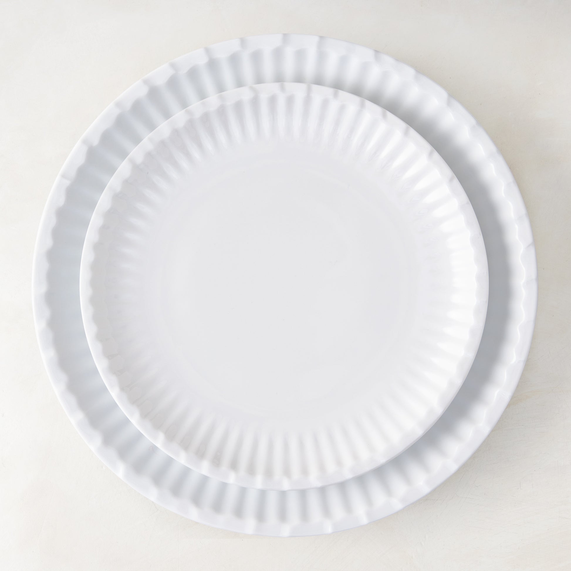 White Melamine Street Eats Salad Plate, 8.5" diameter, with a wavy, paper plate-inspired rim.