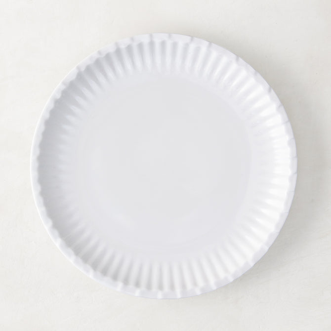 White 8.5" Melamine Street Eats Salad Plate with ribbed edge, mimicking a paper plate.
