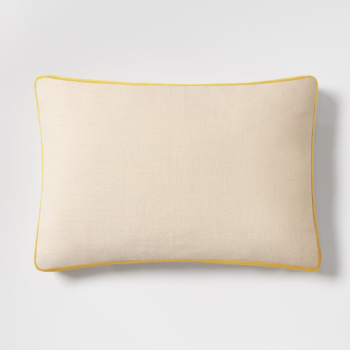 Sun yellow velvet and Belgian linen lumbar pillow with flange detail, 20x14 inches.
