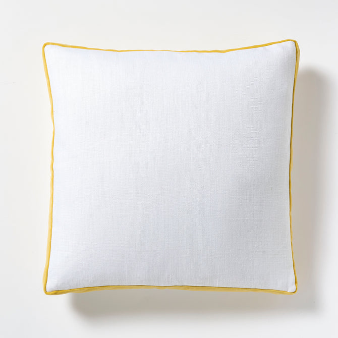 White linen square pillow with sun yellow velvet gusseted trim.