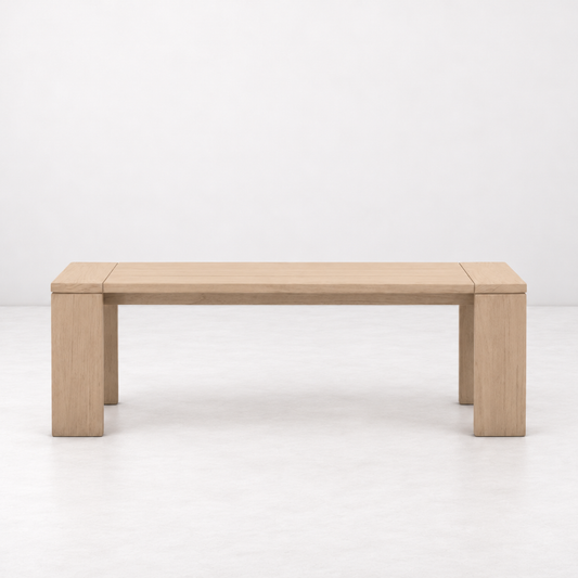 Sur rectangular indoor/outdoor bench in washed teak wood with a wide-leg, minimalist design.
