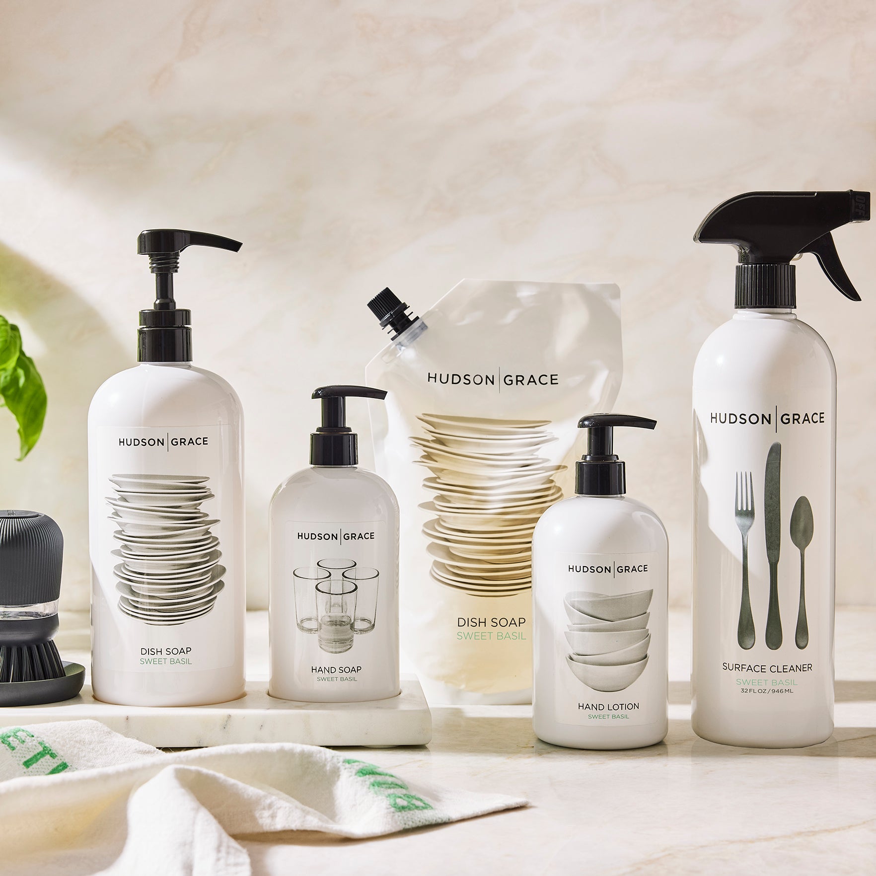 White HG Sweet Basil Dish Soap bottle, 32 oz, with black pump and stacked plate graphic.