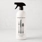HG Sweet Basil Surface Cleaner, 32oz white spray bottle with black top and cutlery graphic.