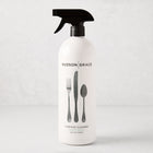 HG Sweet Basil Surface Cleaner, 32oz white spray bottle with black top and cutlery graphic.