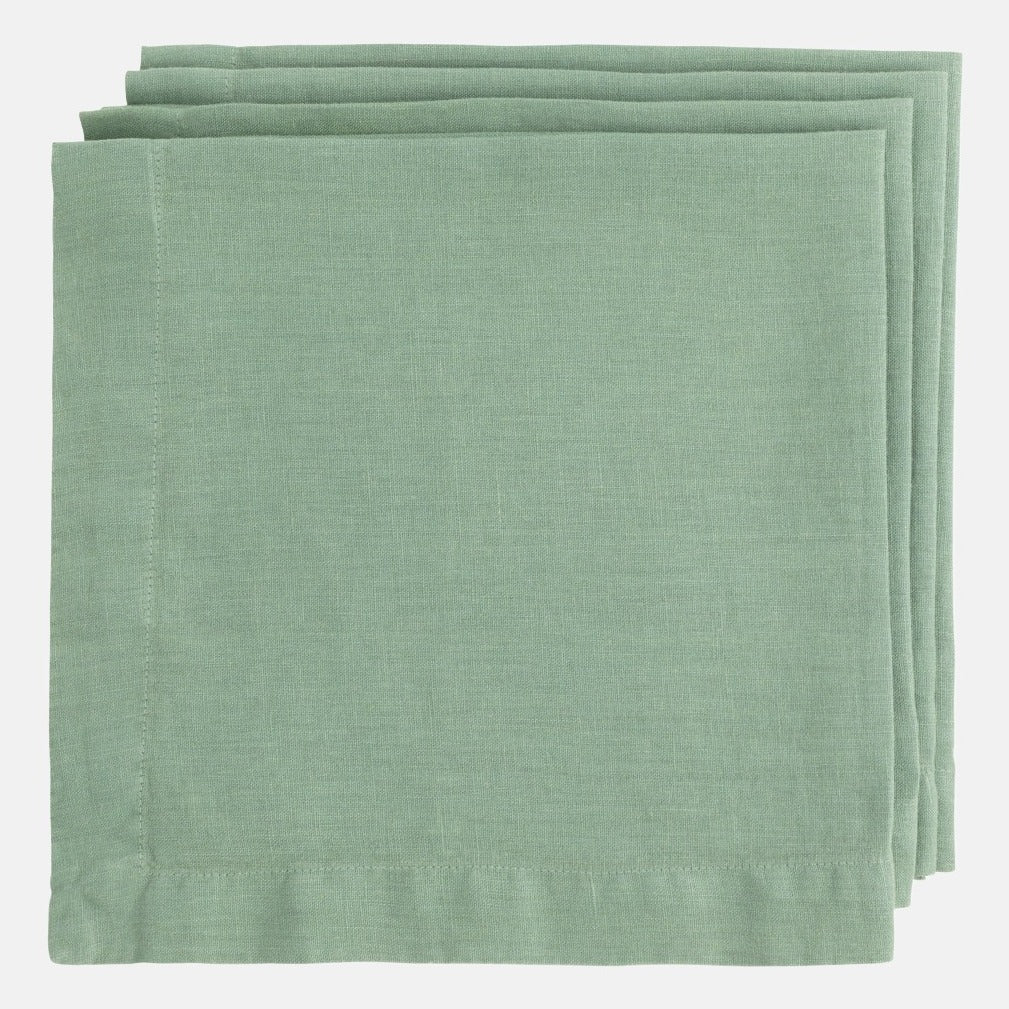 Stack of three Swiss Chard HG Signature hand-dyed sage green linen napkins, 22-inch square.
