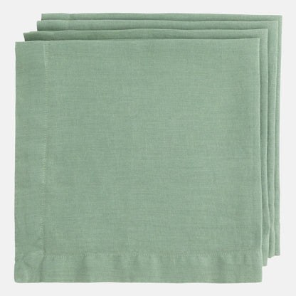 Stack of three Swiss Chard HG Signature hand-dyed sage green linen napkins, 22-inch square.