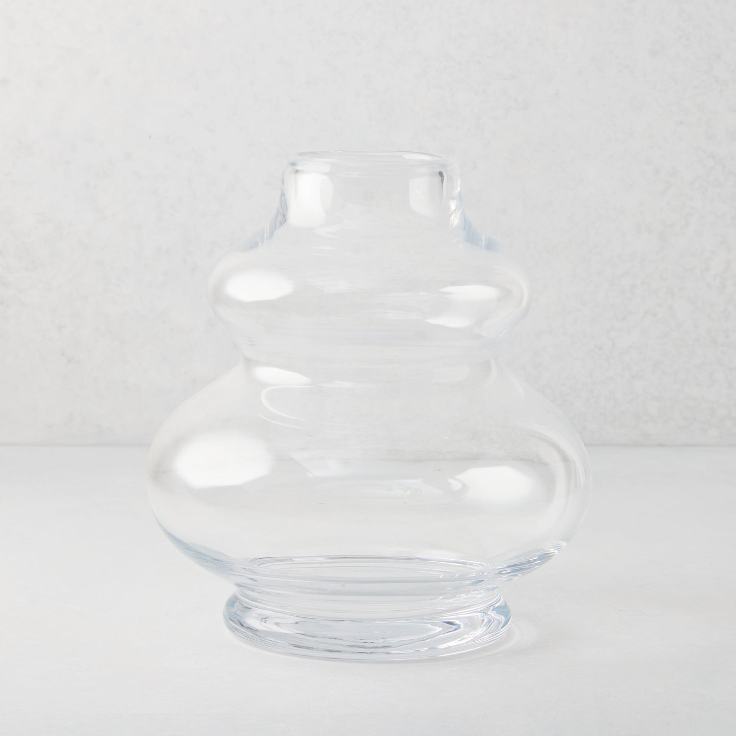 Sylvia Glass Vase, clear mouth-blown glass, sculptural honey dipper silhouette, 9.5"H.
