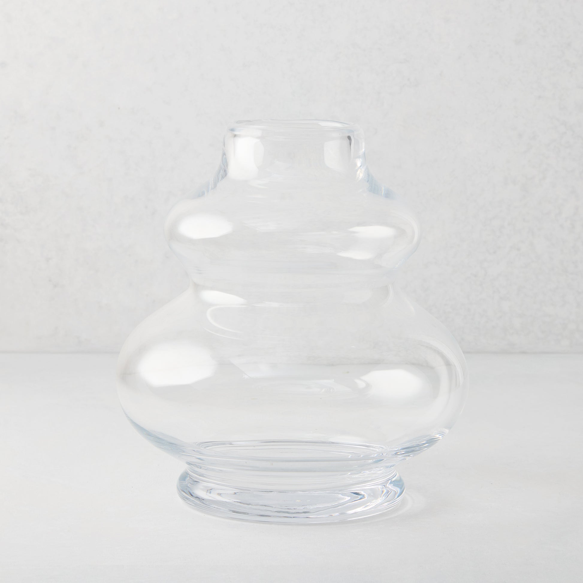 Sylvia Glass Vase, clear mouth-blown glass, sculptural honey dipper silhouette, 9.5"H.