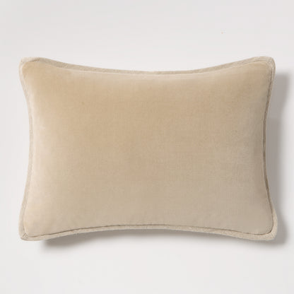 Tan reversible velvet and linen lumbar pillow, 20"L x 14"H, with visible linen piping.