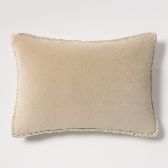Tan reversible velvet and linen lumbar pillow, 20"L x 14"H, with visible linen piping.