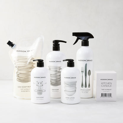 Hudson Grace Tart Kumquat dish soap, hand soap, hand lotion, surface cleaner, refill pouch, and kitchen candle.