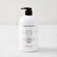 Hudson Grace Tart Kumquat Hand Soap, 16 oz, white bottle with black pump and glass graphic.