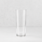 Tavola highball glass with a clear, cylindrical design and a sturdy base on a neutral background.