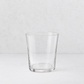 Medium Tavola tumbler made of clear, minimalist glass with a simple, tapered cylindrical design.