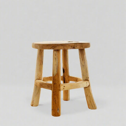 Handmade 17" reclaimed teak wood stool with natural grain and round seat.