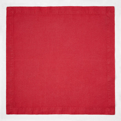 Flame red 22-inch square hand-dyed linen napkin with mitered corners.