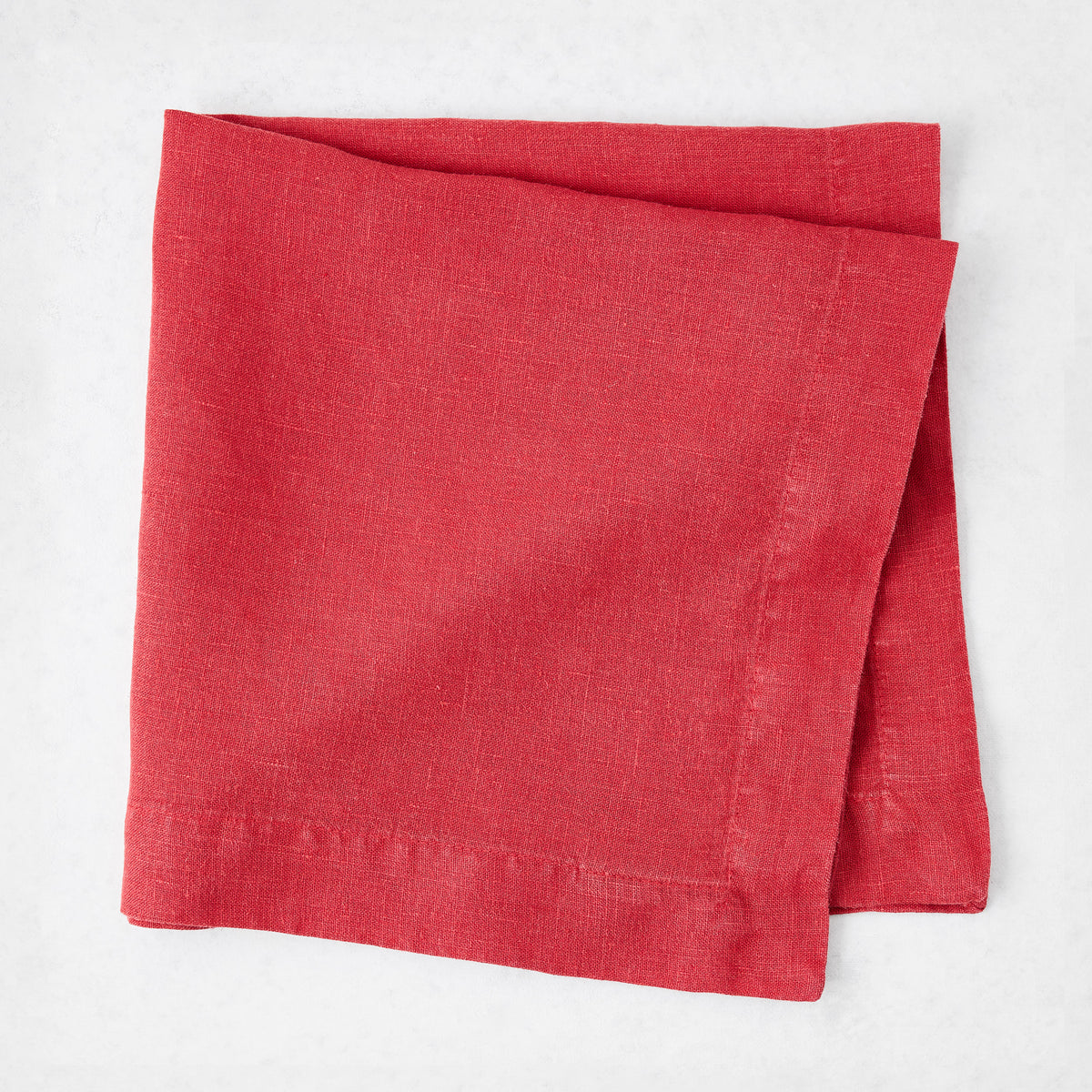 Tennis Shoe HG 22-inch square hand-dyed linen napkin in Flame red with mitered corners.