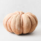 Large handcrafted terracotta pumpkin with a textured, matte finish in warm earthy tones, 12.5 inches wide.
