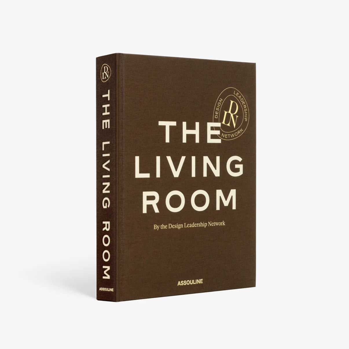 Brown hardcover book, "The Living Room" by Design Leadership Network, Assouline publisher.