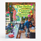 Hardcover book, "The Selby Comes Home," with colorful cover art of a family in a vibrant, plant-filled kitchen.