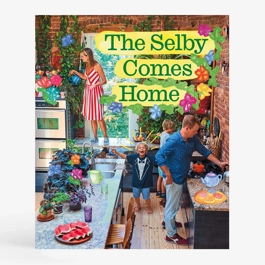 Hardcover book, "The Selby Comes Home," with colorful cover art of a family in a vibrant, plant-filled kitchen.
