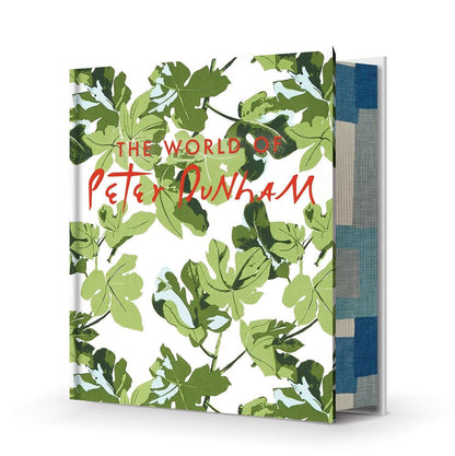 The World of Peter Dunham" book with green fig leaf pattern cover and blue patterned spine.