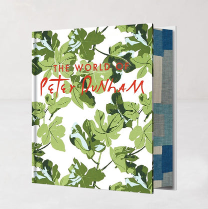 The World of Peter Dunham" book with green fig leaf pattern cover and red title text.
