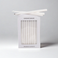 White Hudson Grace Menorah Candles box with a window, showing delicate, elongated paraffin tapers.