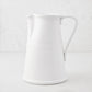 Tivoli white ceramic pitcher with a simple flat handle, 8.6"H.