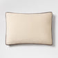 20x14 inch cream linen lumbar pillow with brown velvet gusset trim and flange detail.