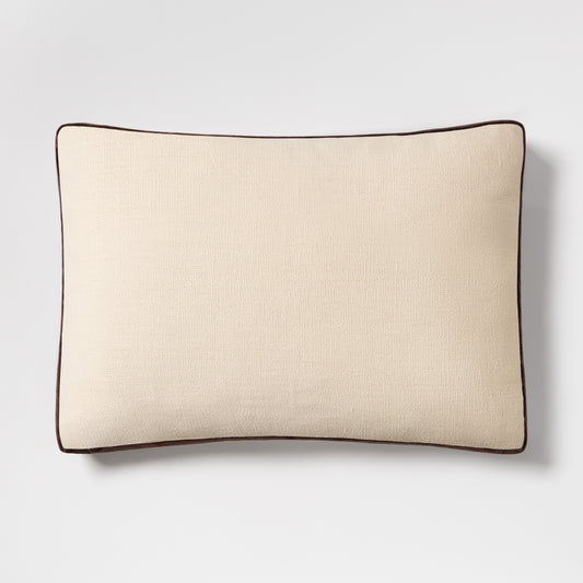 20x14 inch cream linen lumbar pillow with brown velvet gusset trim and flange detail.