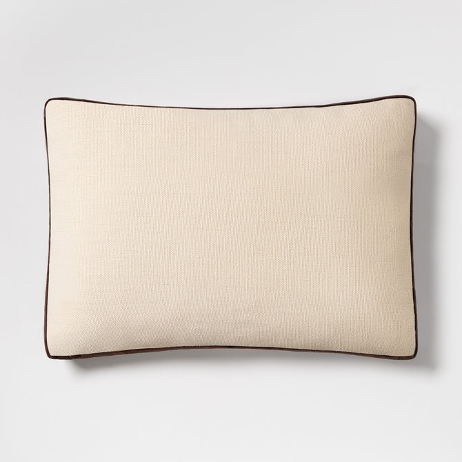 20x14 inch cream linen lumbar pillow with brown velvet gusset trim and flange detail.