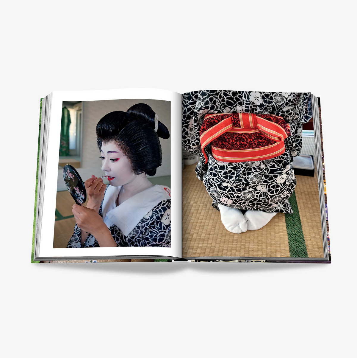 Open "Tokyo Chic" book showing two pages: a geisha applying makeup and a close-up of a kimono with a red obi.